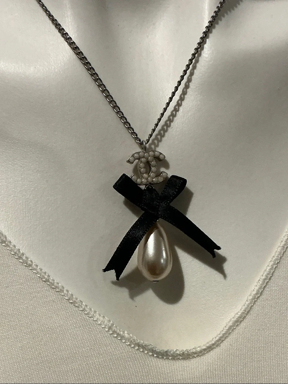 CHANEL Silver-Tone Necklace with Black Ribbon and Pearl Drop